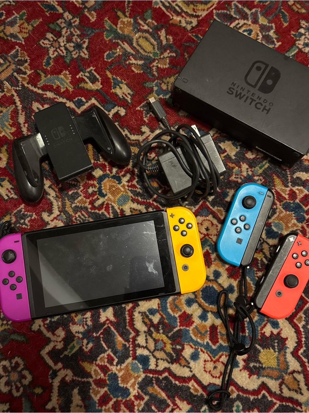 Nintendo Switch with Four Controllers and Games